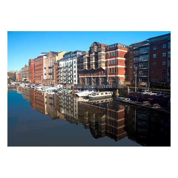 Buildings reflected in water